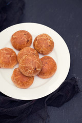 Brazilian snack cheese bread on white plate