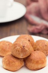 Brazilian snack cheese bread on white plate