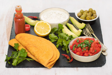 Mexican food in black ceramic board