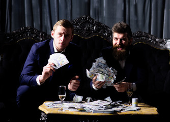 Illegal deal concept. Man holds cash, money, banknotes.