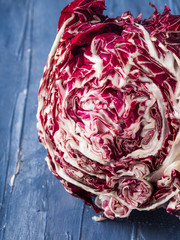 Obraz premium Radicchio red chicory closeup on blue background
