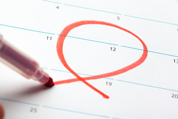 Closeup of dates on calendar page