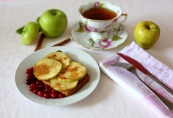 toast with Apple slices on white background