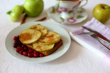 toast with Apple slices on white background