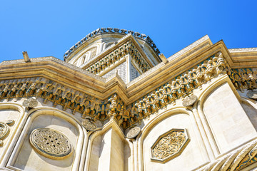 Obraz premium Daylight view from bottom to ornamented monastery facade