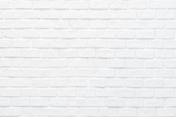 White brick wall texture background with stained old stucco light gray and aged painted cement...