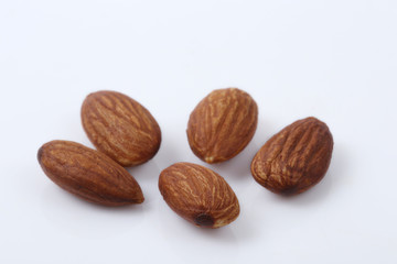 dry almonds nuts on white