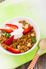 Strawberry Cinnamon Granola Yogurt Breakfast. Selective focus.
