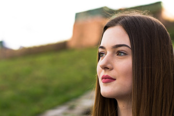 Fototapeta premium Young girl portrait in city in spring