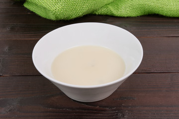 White garlic soup on a table