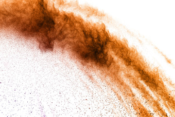 abstract brown dust explosion on white background. abstract brown  powder splattered on white...