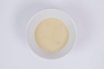 White garlic soup on a white