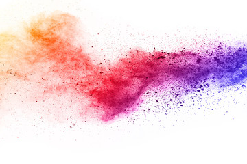 abstract powder splatted on white background,Freeze motion of color powder exploding/throwing color...