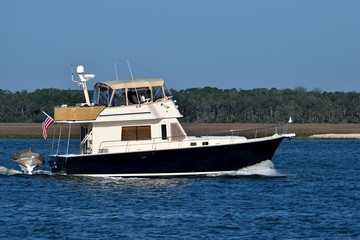 Fototapeta na wymiar luxury yacht cruising on the river