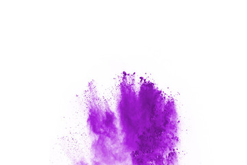 Purple powder explosion on white background. Colored cloud. Colorful dust explode. Paint Holi.