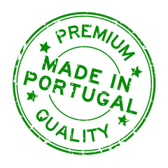 Grunge green premium quality made in Portugal round rubber seal stamp on white background