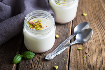 Natural yogurt in a glass jar
