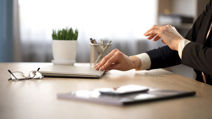 Business lady finishing project and closing laptop computer, career, workplace