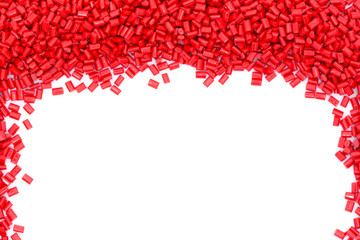 Red plastic polymer granules.