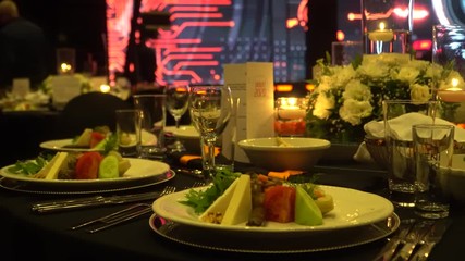 business meeting or wedding hall dinner and flowers elegant concept
