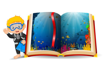ocean scenery in the book and kid wearing a diving costume
