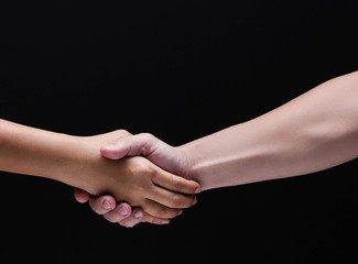 Closeup human hand touch together.Checking hands to be sign and symbol of greeting and success deal,