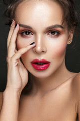 Beautiful woman portrait close up with red lips.