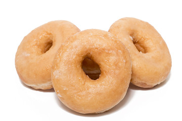 Donuts over white background