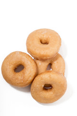 Donuts over white background