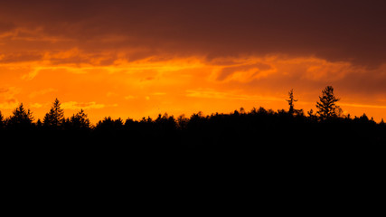 Colorful sunset over the Alps with Sahara Sand in the air