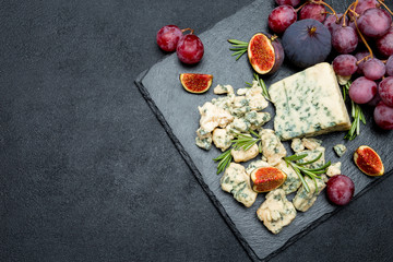 Slice of French Roquefort cheese with figs