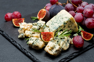 Slice of French Roquefort cheese with figs