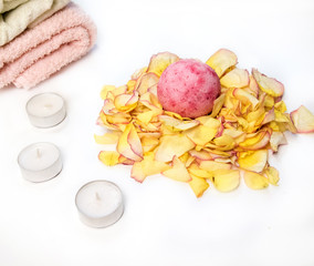 Spa still life with bath bombs and rose.