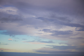 Beautiful sunrise clouds over the ocean at Paarden Eiland beach.
