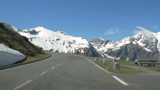 Driving POV on Grossglockner Hochalpenstrasse (High Alpine Road) at around 2000m elevation in Salzburgland, Austria.