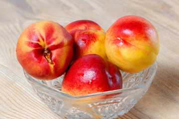 Group of ripe juicy nectarines close-up