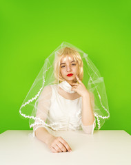 Beauty woman with wedding hairstyle and makeup. Bride fashion. Woman in white dress. Girl with stylish haircut.