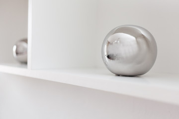 round ball on shelf