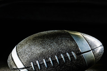 American football over black background © Angelov