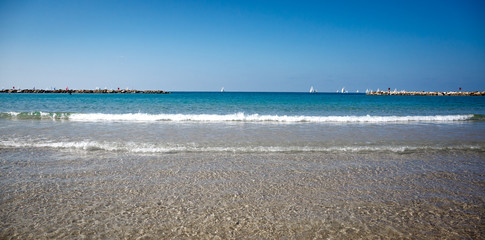 Blue sky and Mediterranean Sea in summer, sand beach and wave, izrael land
