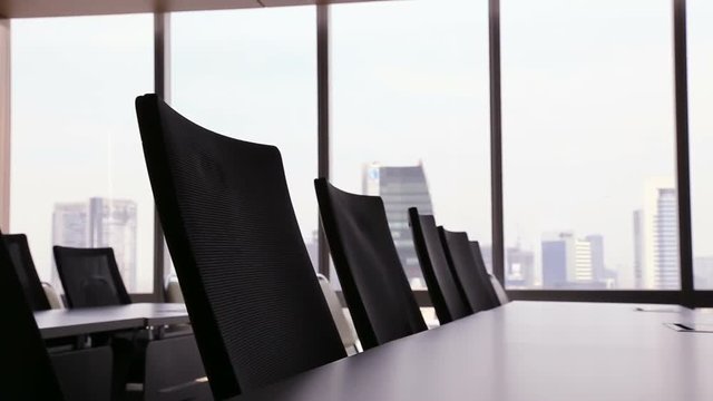 Table and chairs in meeting room.
