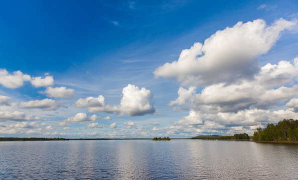 White clouds over the northern lake