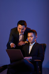 Coworkers with laptop