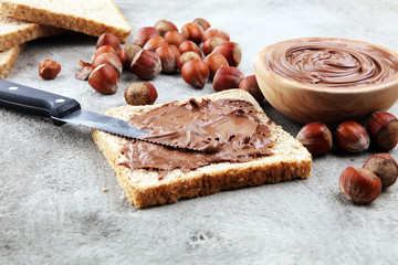 Homemade hazelnut spread in wooden bowl. Hazelnut Nougat cream