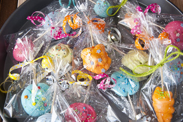 Colorful candy background. meringue in package. candy shop, shoping and sale concept. black friday and cyber monday.