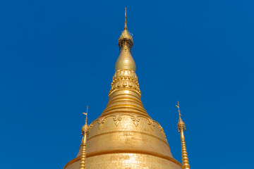 Fototapeta premium Shwedagon Pagoda is a beautiful golden pagoda located at Tachileik, Myanmar.