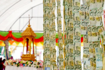Banknotes donate in Thai temple
