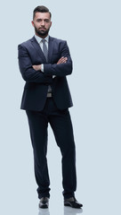 in full growth. businessman arms folded