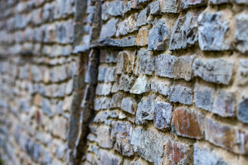 abstraction wall fence built of natural stone background