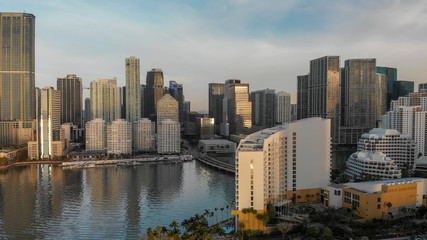 MIAMI - MARCH 31, 2018: Brickell Key and Downtown Miami aerial view. The city attracts 20 million tourists annually